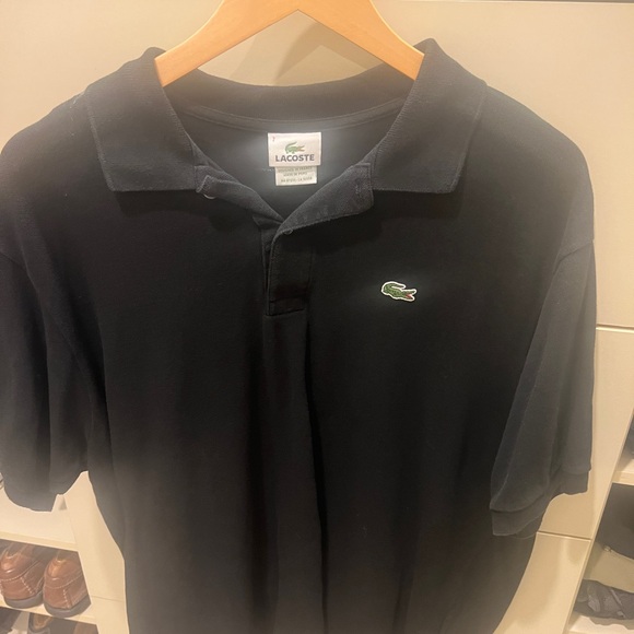 Men’s polo Lacoste short sleeved 
Size 7 XL Black 
Bundle them up for  savings - Picture 1 of 1